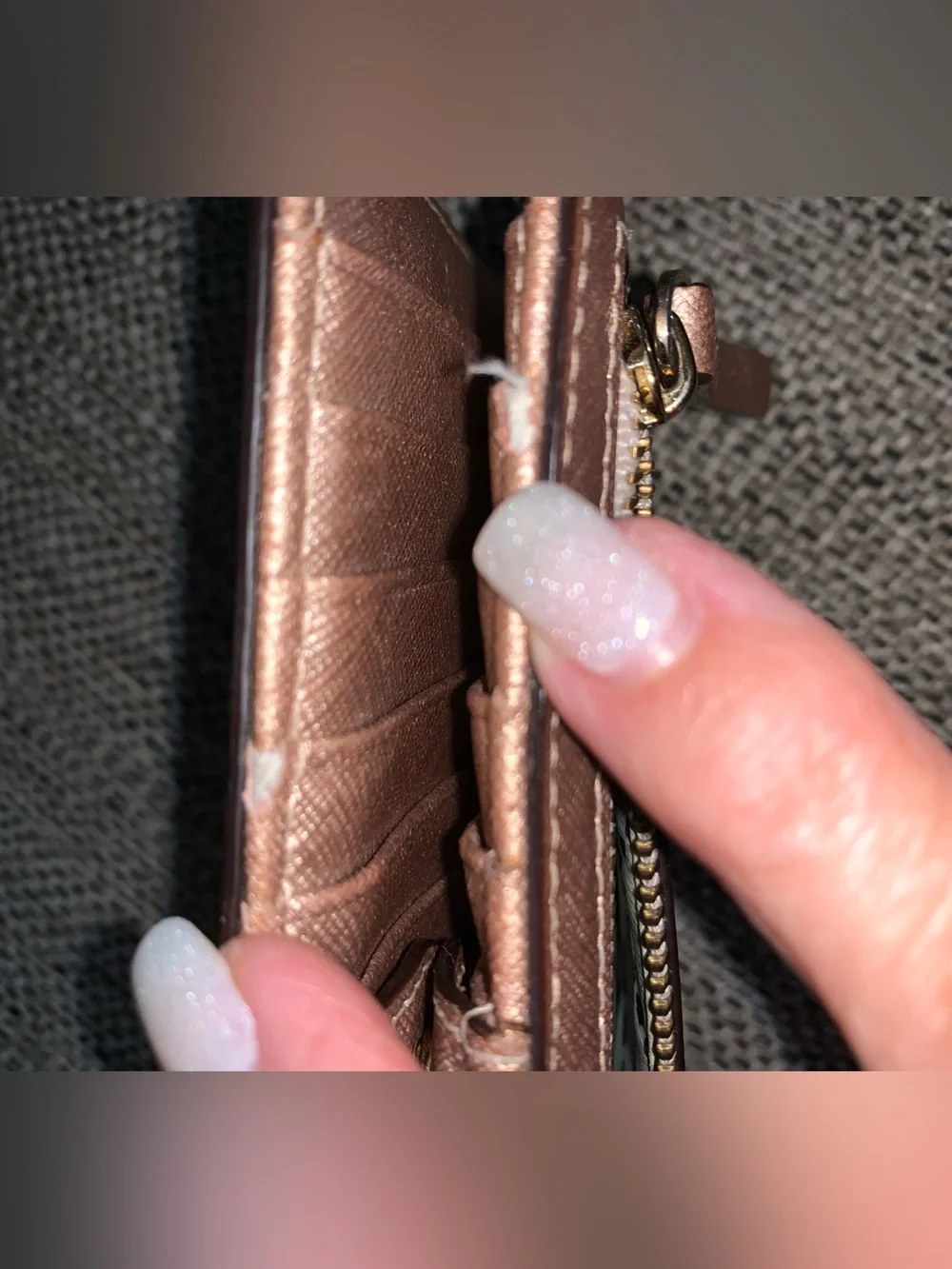 Kate Spade rose gold wallet with callouts